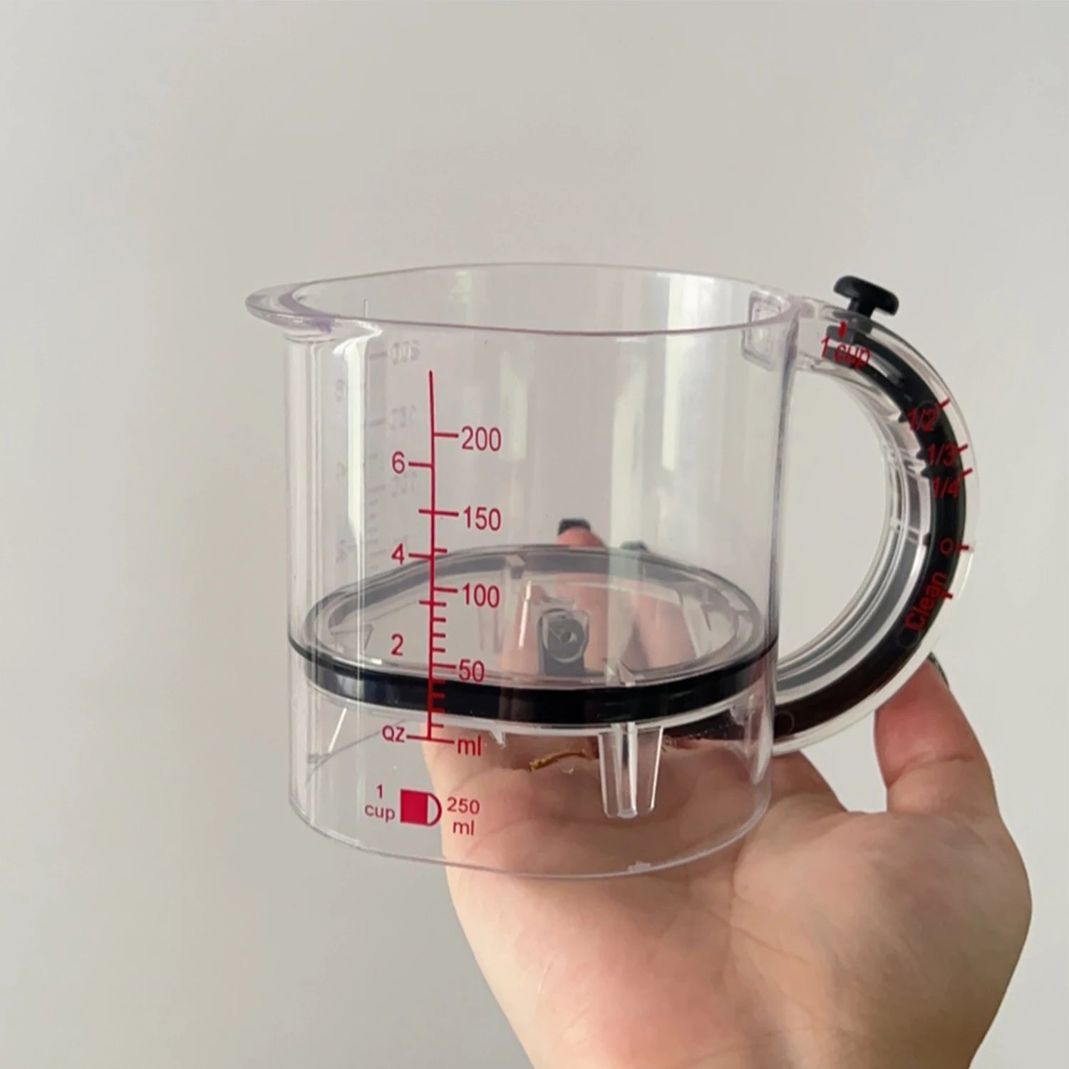 4-in-1 Adjustable Measuring Cup – Multi Kitchen Tool with Scraper Base